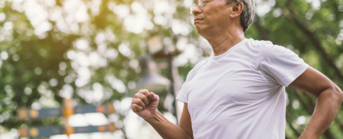 senior man jogging out doors