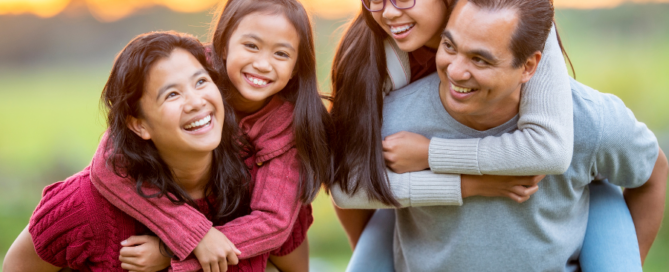 parent with two daughters enjoying eachothers company