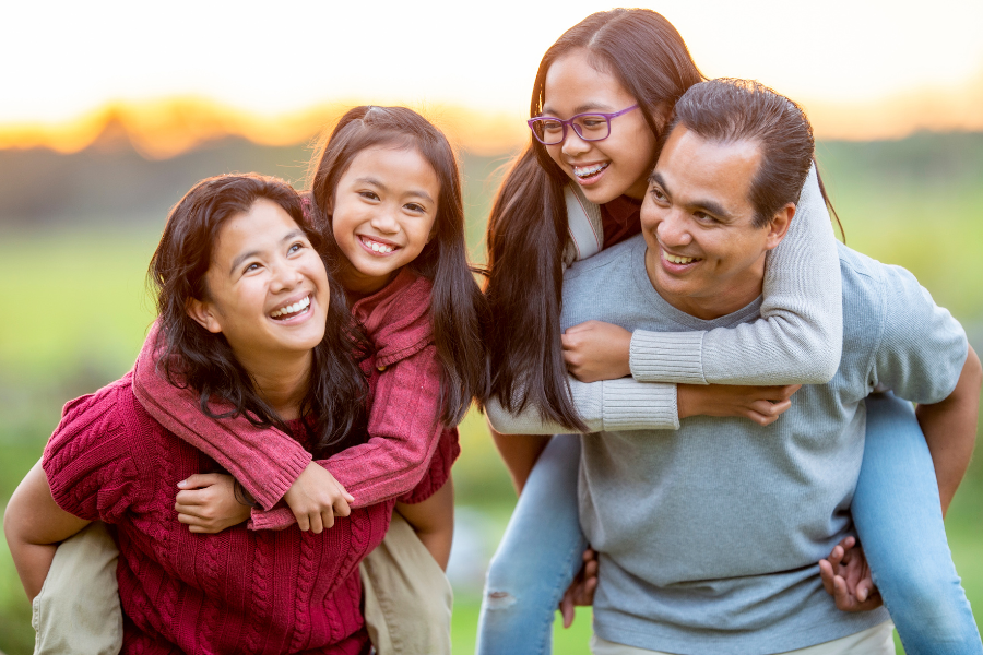 parent with two daughters enjoying eachothers company